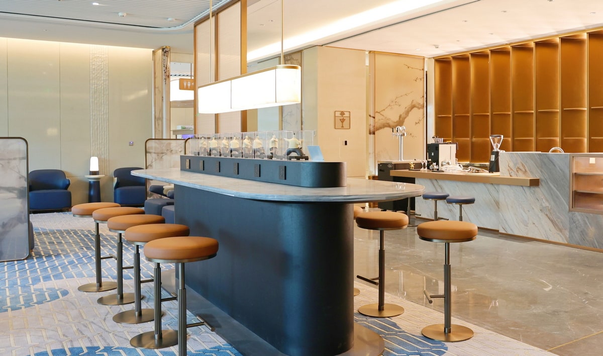 seating and tables, with a bar area in the background.