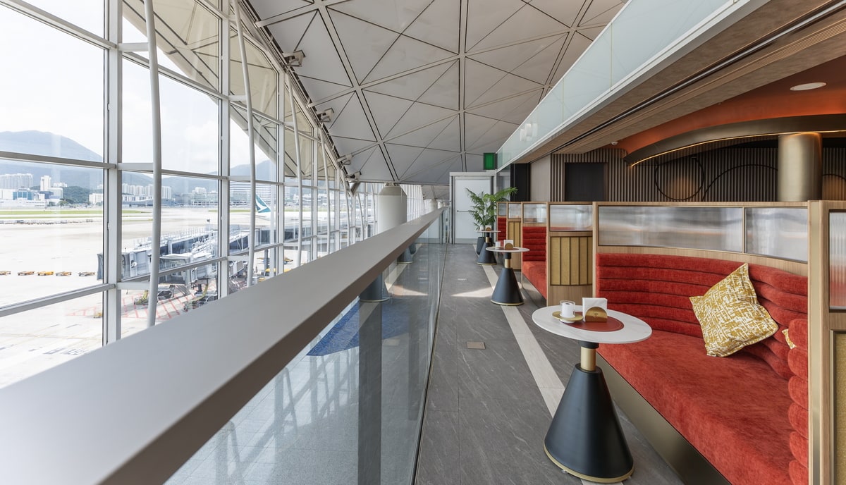 Window seating and views of planes and gate area.