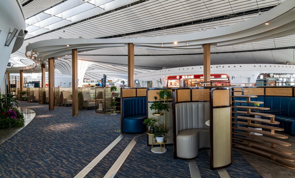 seating area with sofas, tables and chairs.