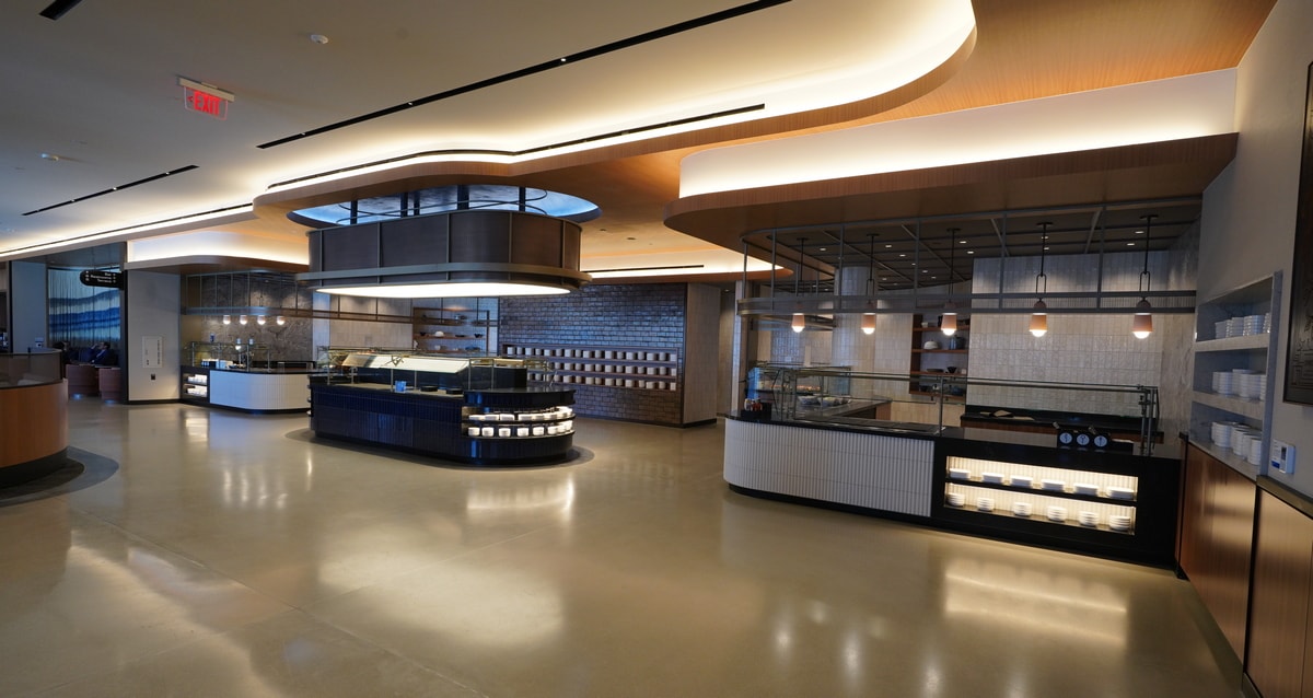 buffet area with serving areas, plates and center island.