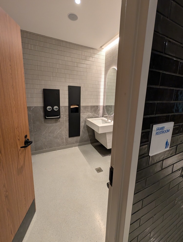 entrance to one of the family restrooms, with the door open.