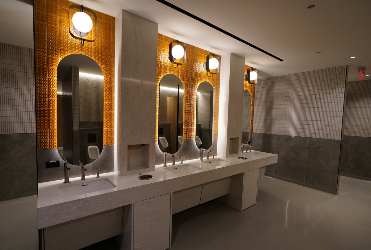 restroom sink and mirrors.